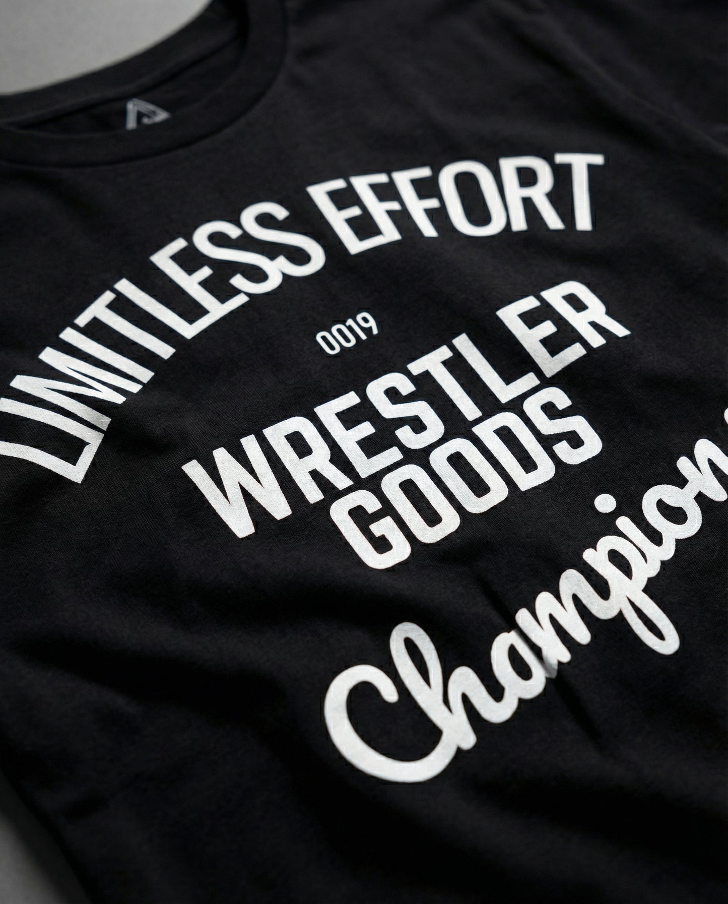 WRESTLER GOODS CHAMPIONS T-SHIRT | BLACK